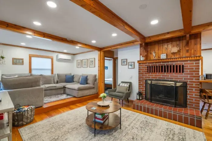 Stylish living room featuring a statement fireplace and elegant decor.