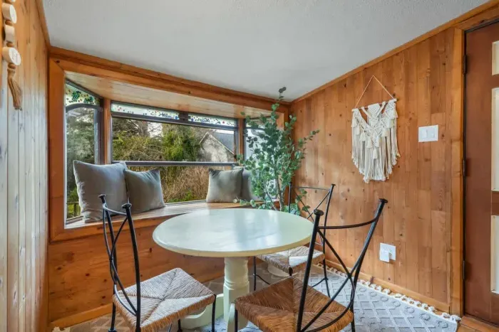 Charming dining nook with rustic accents and plenty of natural light.