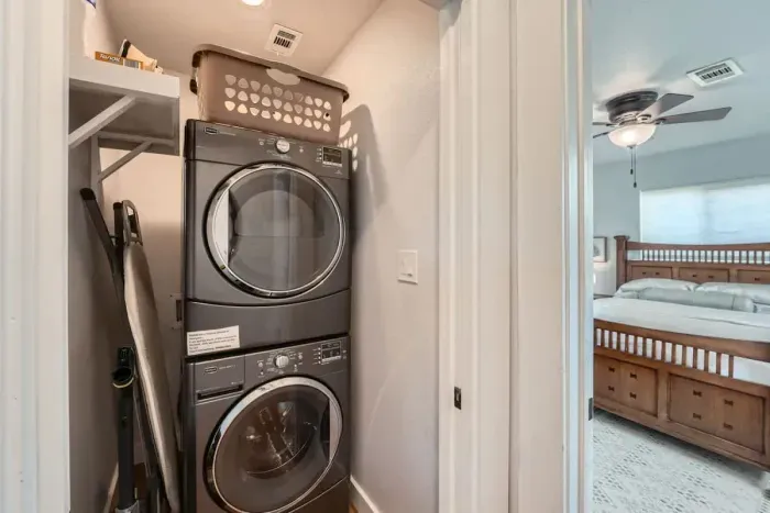 Efficient laundry space with modern appliances and a practical layout for completing laundry tasks with ease.