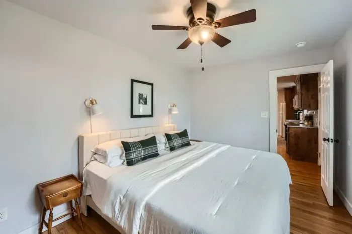 Rest easy in a comfortable bedroom featuring a king-size bed, soft linens, and a calming atmosphere.