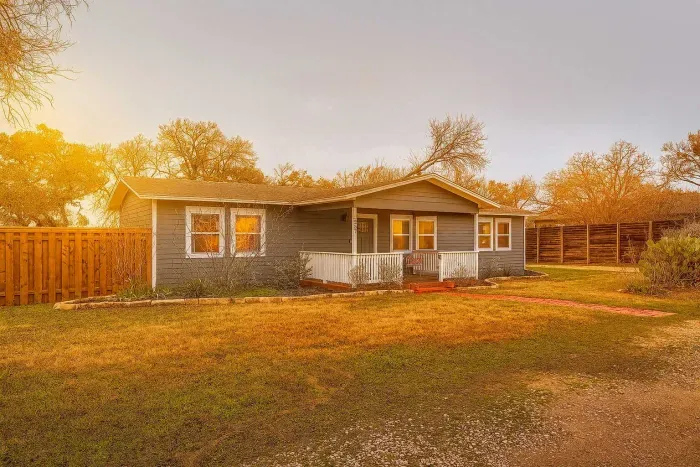 Big yard, cozy porch, this home’s charm shines inside and out.