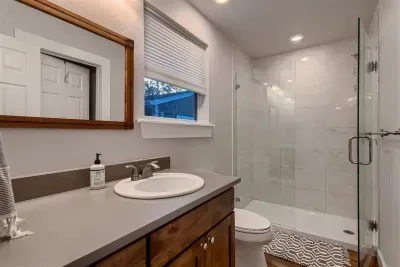 Enjoy a refreshing morning routine in a bright, beautifully designed space.