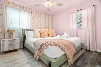 Peaceful bedroom with a plush king-sized bed and soft linens for a restful night’s sleep.