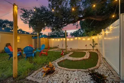 Private backyard with tall fences, providing a quiet and secure space for relaxation.