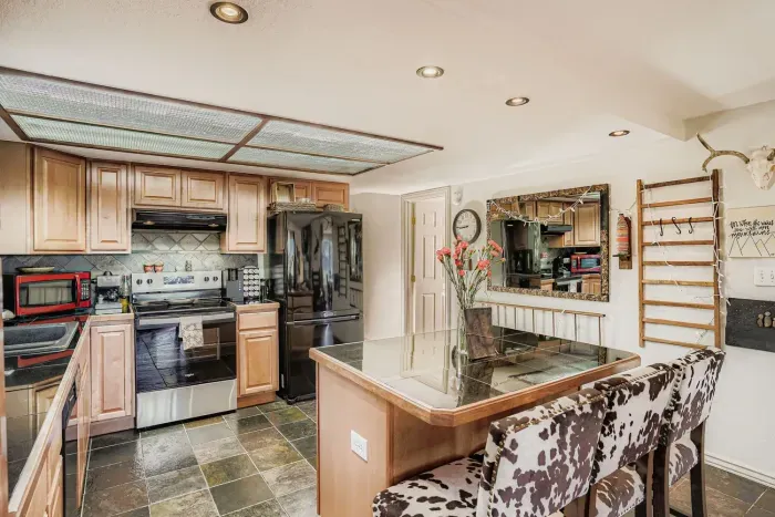 Chef’s kitchen with open layout ideal for family cooking and entertaining.