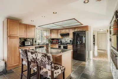 Fully equipped kitchen with modern appliances and plenty of counter space.