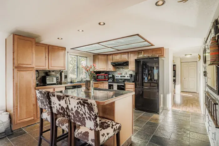 Fully equipped kitchen with modern appliances and plenty of counter space.