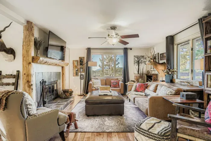 Warm and inviting lounge perfect for gathering around the fireplace.