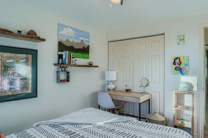 Bright third bedroom perfect for families or guests.