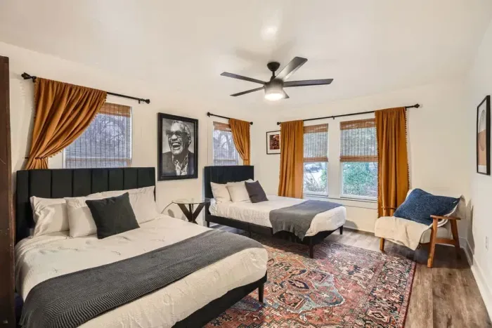 Serene bedroom with calming colors and thoughtfully chosen furnishings.