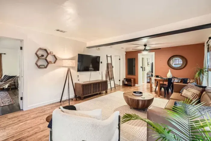 Equipped with a large TV, cozy seating, and space for everyone.