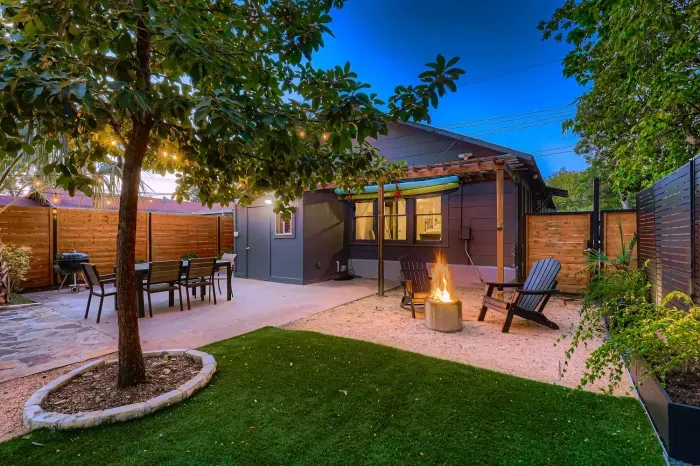Twilight view of the backyard pool perfect for winding down.