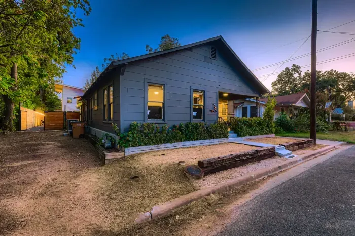 Charming view of the home’s exterior at sunset.