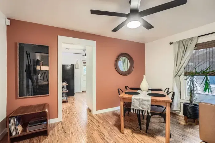 A cozy dining area to enjoy meals, games, or a glass of wine together.