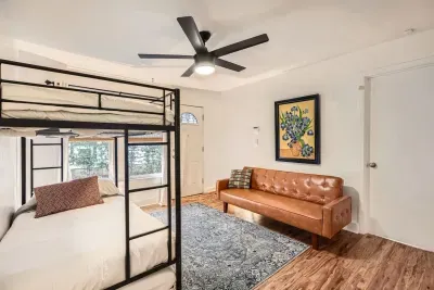 Guest-friendly bedroom with a cozy vibe and ample storage space.