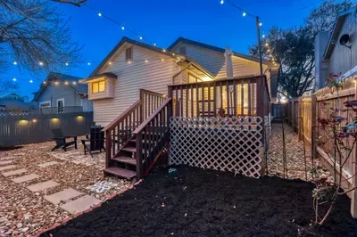 Ambient backyard escape with curated lighting and comfortable outdoor seating