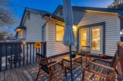 Evening-ready deck with ambient lighting and intimate seating area