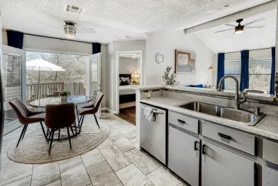 Bright kitchen and dining flow with patio access, perfect for easy mornings and relaxed evenings at home