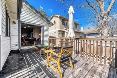 Seamless indoor outdoor flow with direct access from dining to a comfortable deck lounge