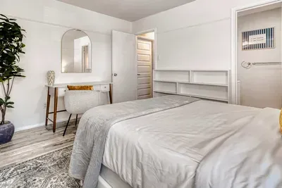 Spacious retreat with dedicated workspace and thoughtful design for both relaxation and productivity