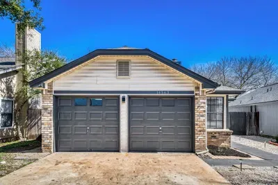 Front exterior with two-car garage and easy access, designed for convenience and comfort