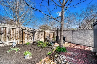 Quiet outdoor corner with patio seating and shade, offering a peaceful place to recharge outdoors