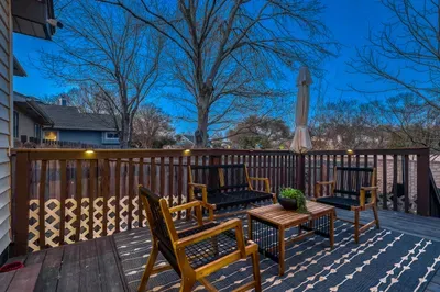 Elevated deck at twilight with cozy seating and ambient lighting for evening unwinding