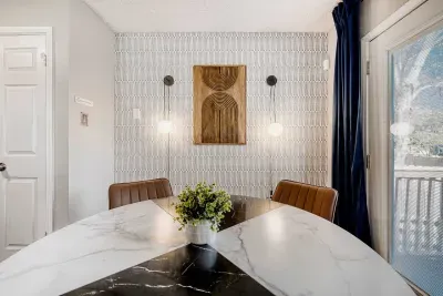 Modern marble table with comfortable seating creates a clean and inviting place to gather