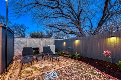Inviting outdoor lounge with decorative lighting and relaxed backyard vibe