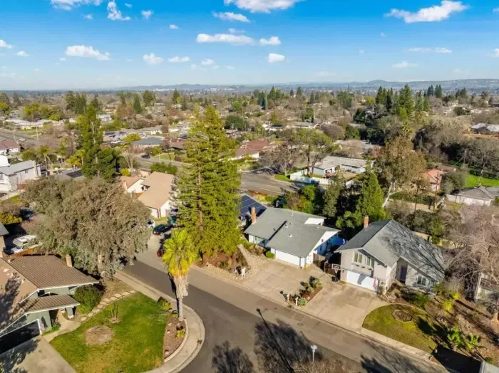 Quiet residential area with tree-lined streets and nearby amenities.