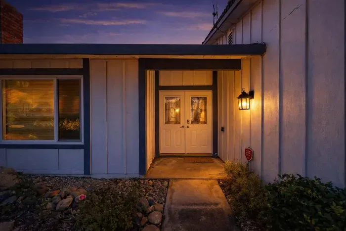 A clean, well-maintained path leading directly to the front door.
