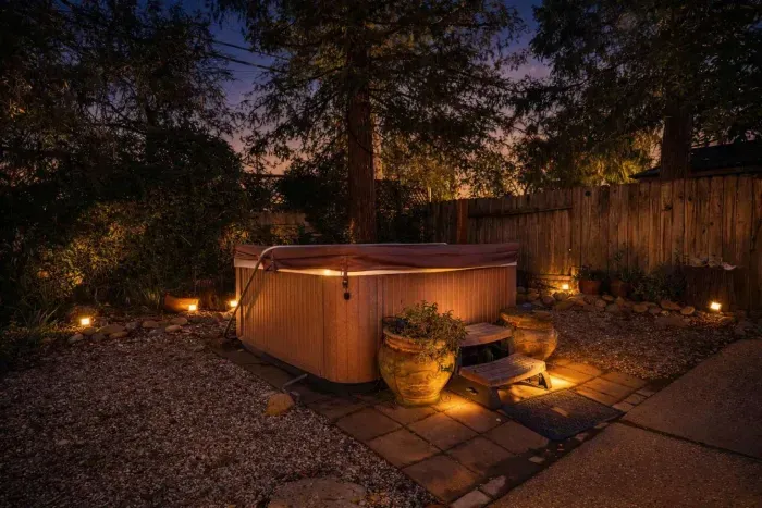 Unwind in the hot tub after a long day of exploring or lake activities.