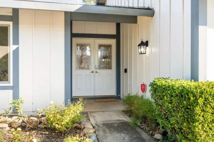Step into a bright, modern home with charming curb appeal and easy self check-in.