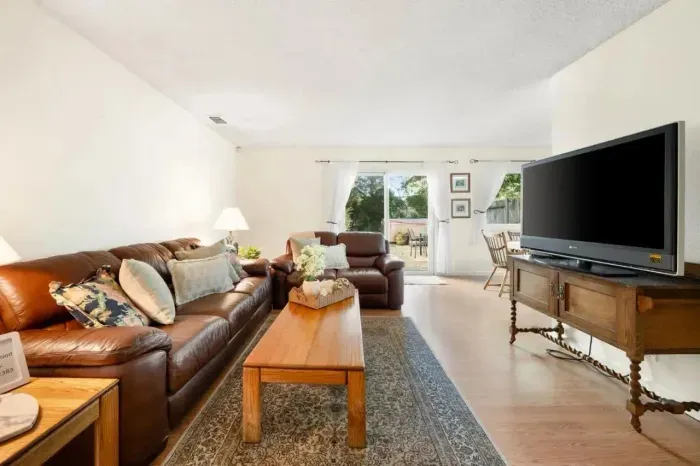 Spacious seating and entertainment setup for relaxing evenings.