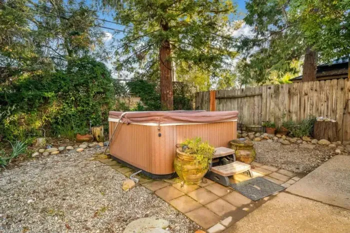 Unwind in the hot tub after a long day of exploring or lake activities.