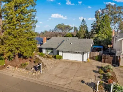 Clear layout of the home and backyard within a peaceful neighborhood.