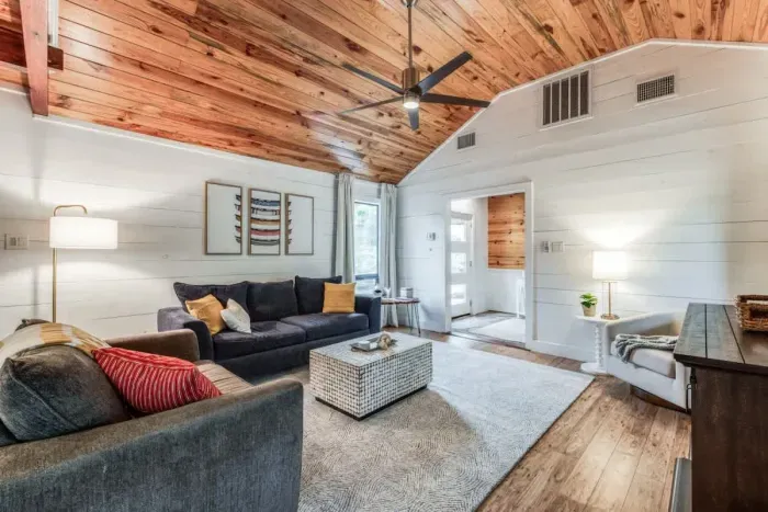 Bright and airy living space with modern furnishings and plenty of natural light.