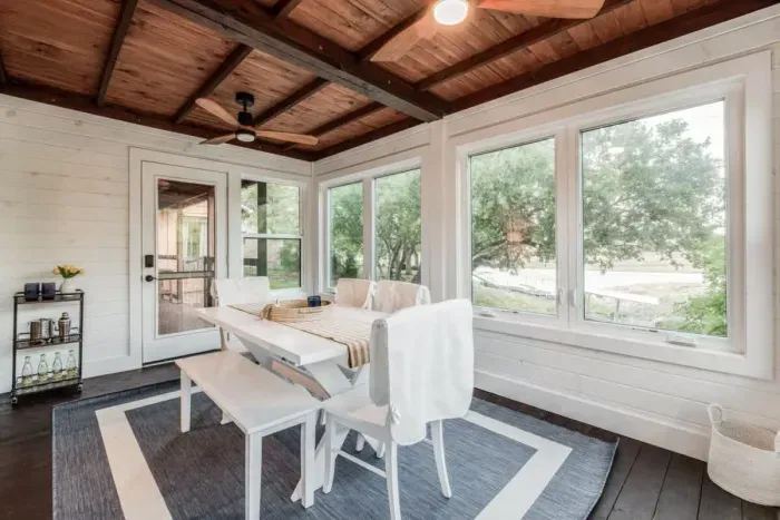 Versatile property featuring both outdoor and indoor dining spaces alongside an exciting game room. Perfect for entertaining guests, this dynamic setup offers diverse options for socializing and leisure, catering to all.