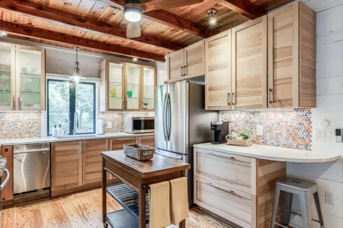 Charming kitchen with rustic touches and updated appliances for a perfect blend of old and new.
