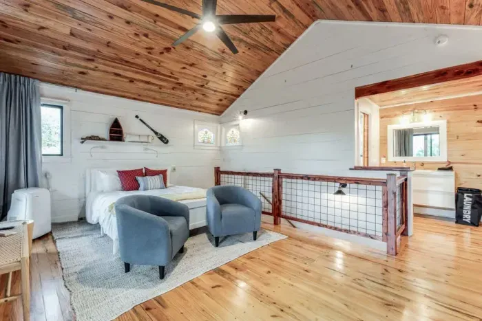 Relax in Bedroom 2, featuring a comfortable queen-sized bed, perfect for a restful night's sleep. This cozy room offers a serene atmosphere with elegant décor and ample space for a peaceful retreat.