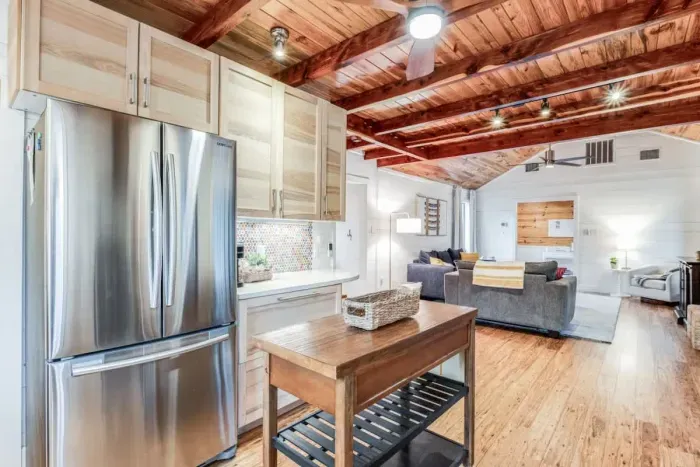 Warm and inviting kitchen with beautiful countertops and all the comforts of home.