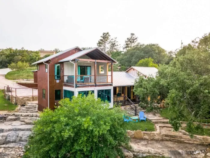 Vibrant backyard with a colorful mix of plants and flowers, creating a bright and cheerful atmosphere.