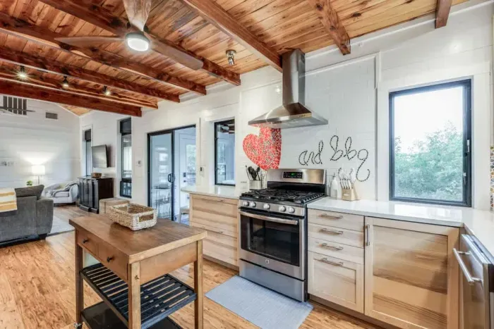 Enjoy family meals or casual snacks in this well-appointed kitchen with plenty of natural light.