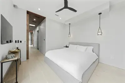 A king-size bed, high-end linens, and elegant decor make this room a luxurious retreat for relaxation.