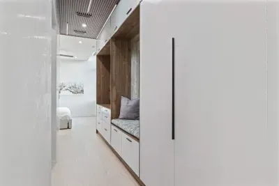 Cleverly designed clothing storage in the second bedroom seamlessly blends functionality with style, offering an elegant solution for modern living.