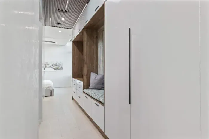 Cleverly designed clothing storage in the second bedroom seamlessly blends functionality with style, offering an elegant solution for modern living.