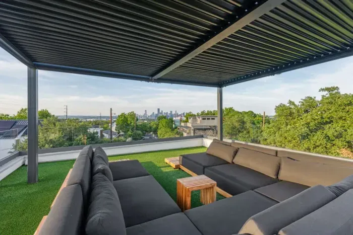 Modern patio with comfortable furniture, creating a stylish outdoor space for both relaxation and entertainment.