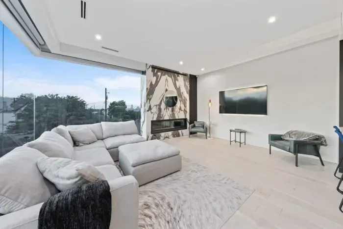Stylish living room featuring a statement fireplace and elegant decor.