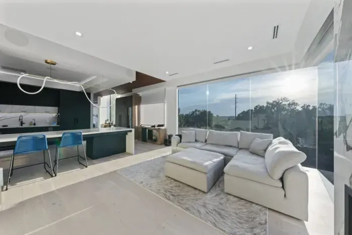 Big windows, big views, and big comfort.  This is where morning coffee tastes better and evenings feel brighter.