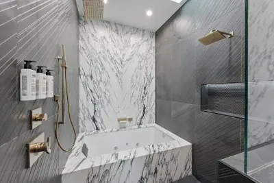 Unwind in our spacious bathroom with modern amenities full of luxury